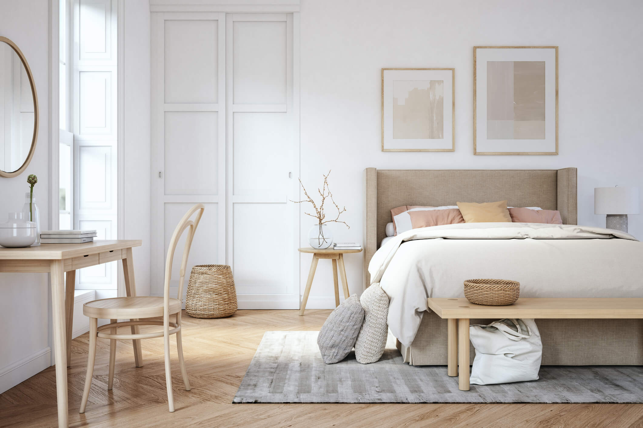 Bright modern furnished bedroom with neutral decor and workspace area