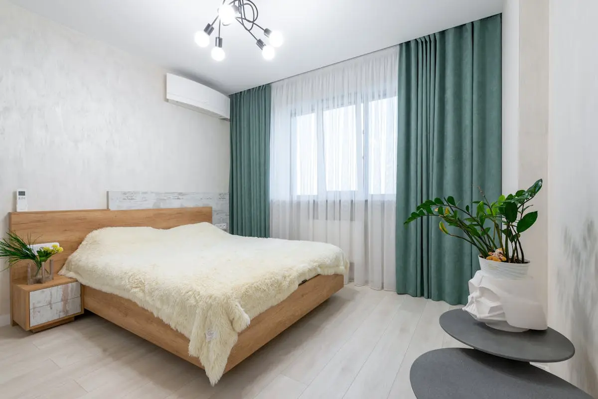 Bright furnished bedroom with modern décor in a corporate housing apartment