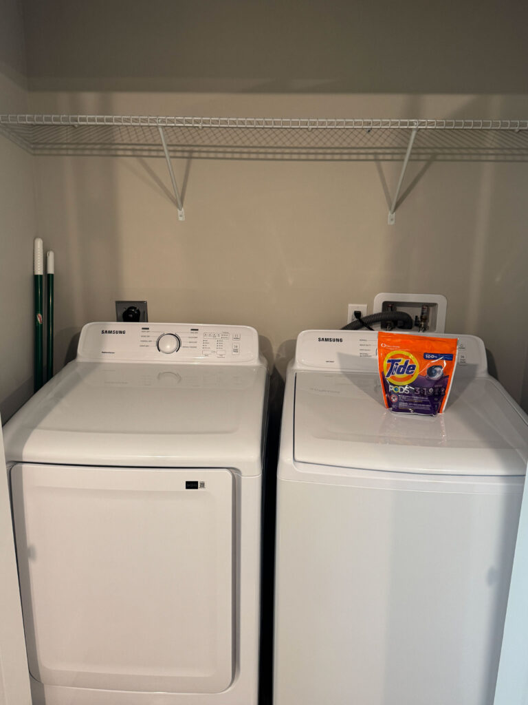 In unit washer and dryer at Dream Winter Haven furnished apartment community in Winter Haven Florida